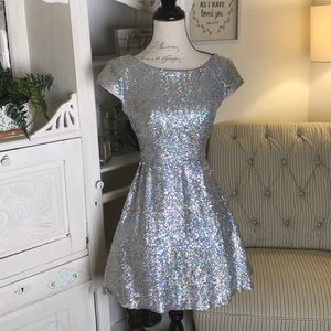 Holographic sequined, low back dress.